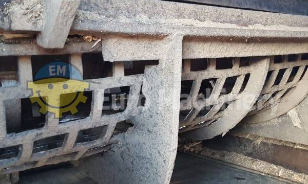Part of large industrial wood chipper.