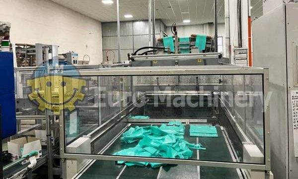 Carrier bag making machine for T-shirt bags.