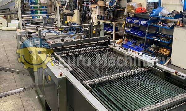Plastic bag making machine produces side & bottom weld bags.