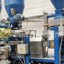 Twin screw compounding extruder used in recycling.