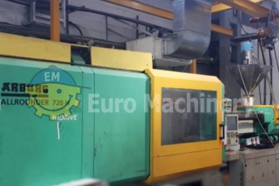 Introducing a plastic molding machine for food containers. The machine is in good working condition.
