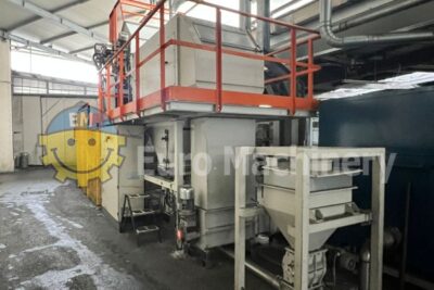 Full granule storage system with sacks emptying machine